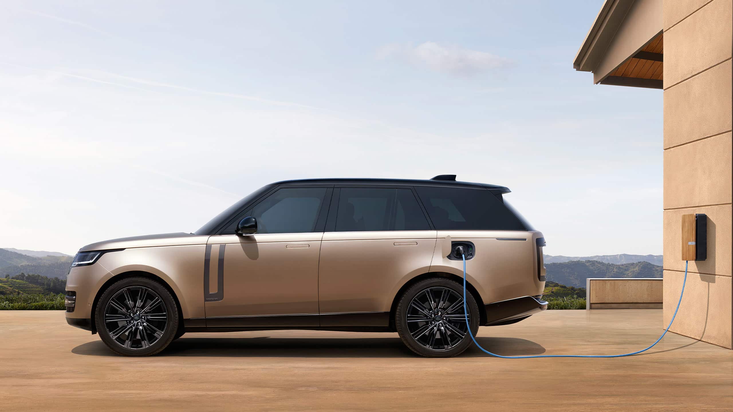 New Range Rover plugged in side view