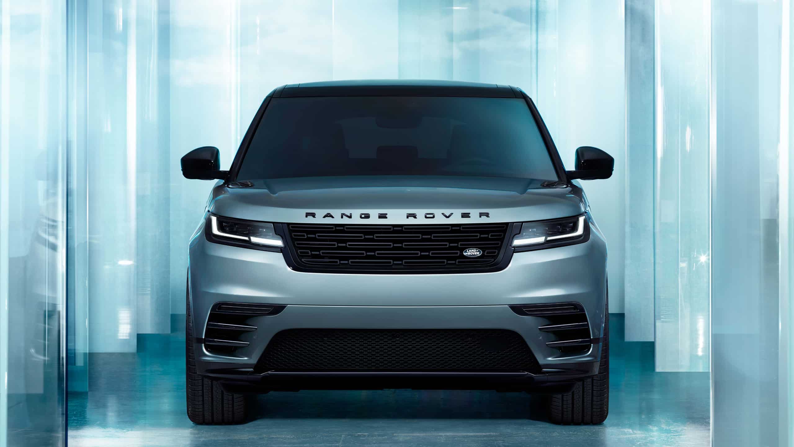 Range Rover Velar Parked in blue glass showroom