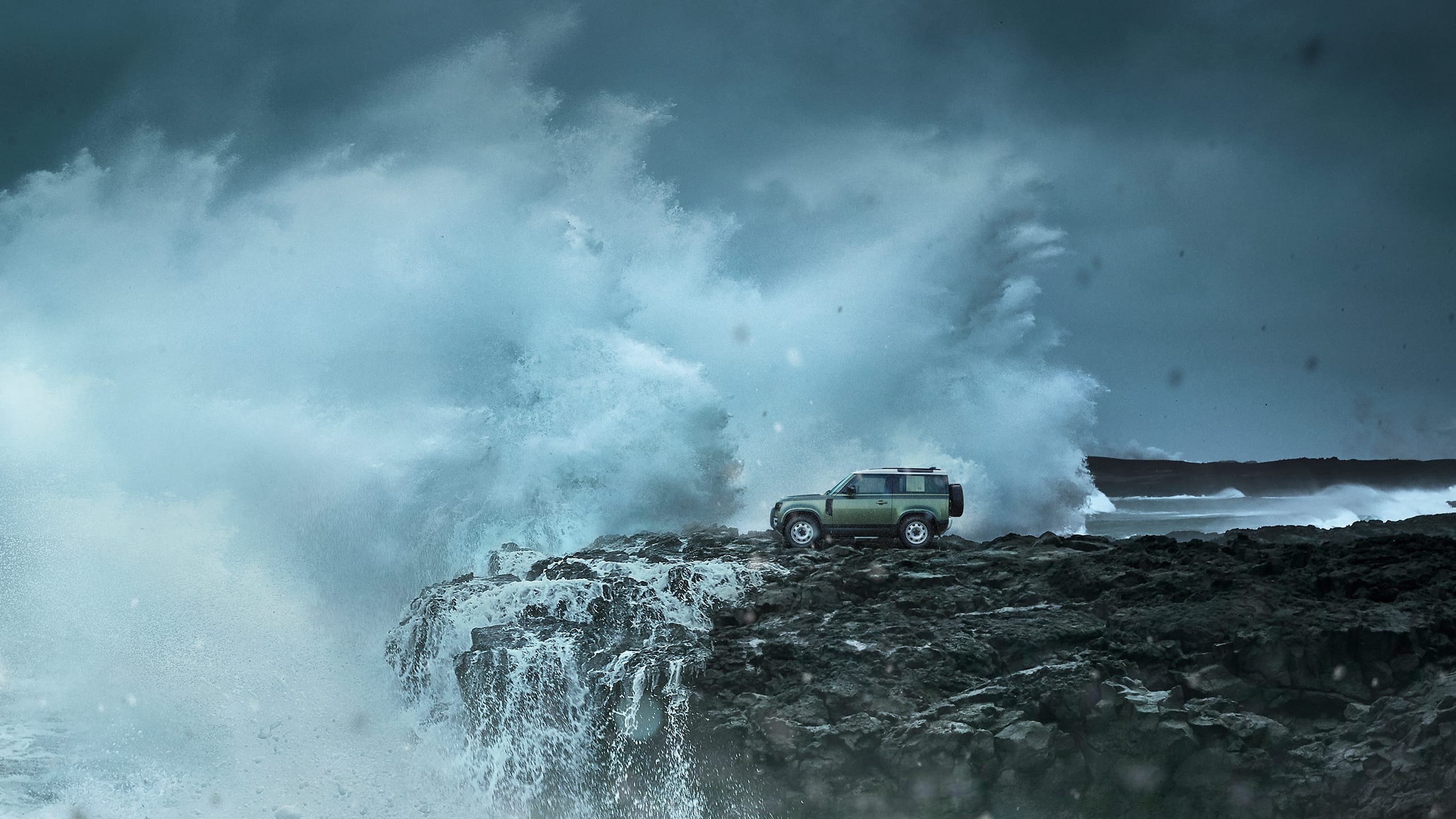 Defender on Mountain surrounded with water